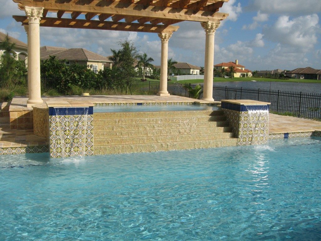 Custom pool and raised spa with columns