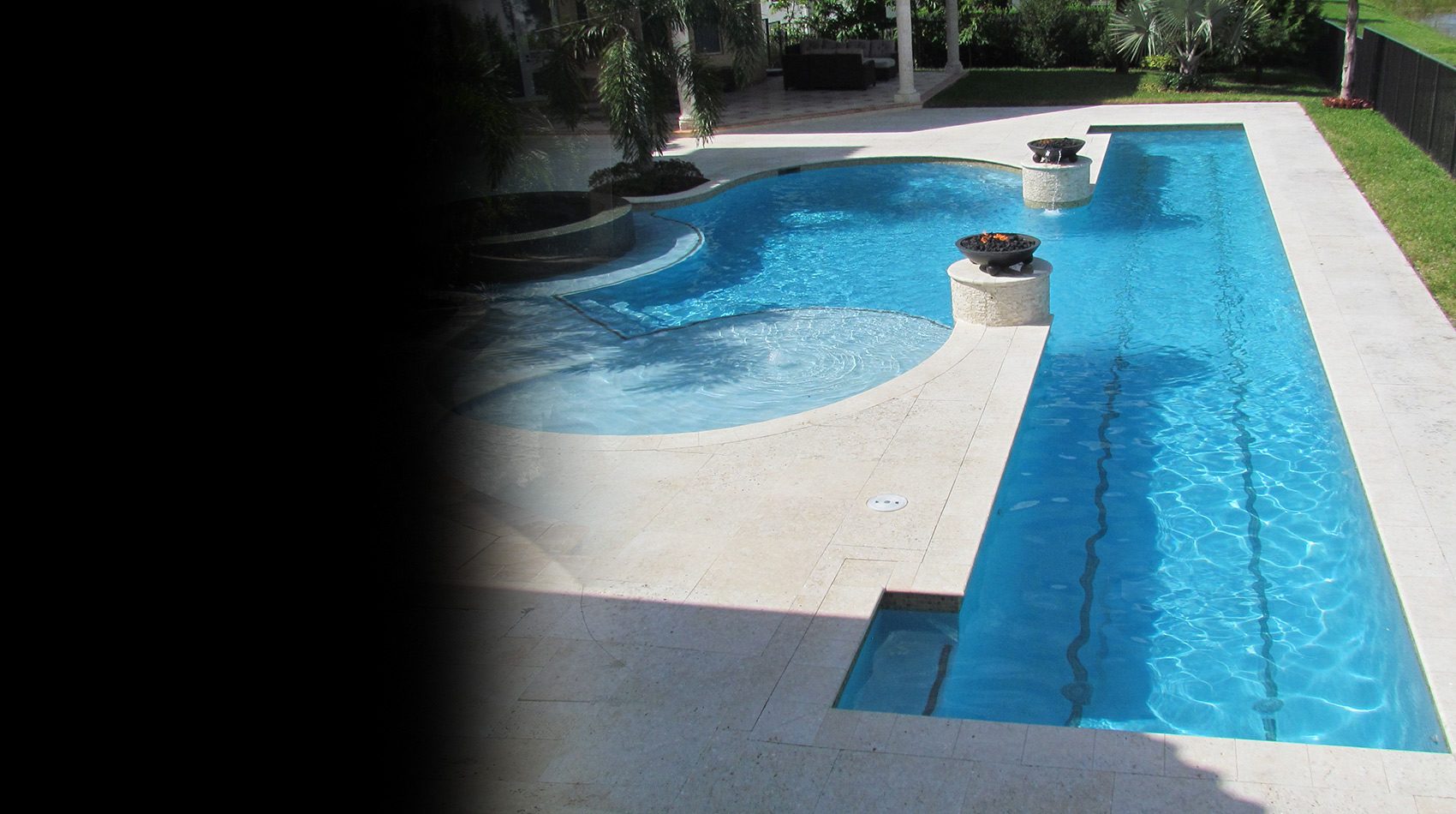 Long lap pool beside a home